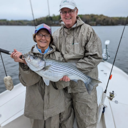 Couple Catching Striper on Lake Lanier April 2023