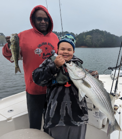Family Catches Fish on Lake Lanier