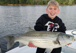 Kid catches Lake Lanier Striper