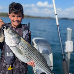 Kid Catching Lake Lanier Striper