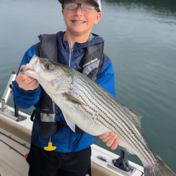 Kid catches Lake Lanier Striper