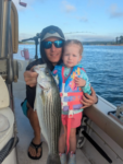 Even young ladies love Lake Lanier Striper Fishing