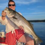 Lady Catches Great September Lake Lanier Striper